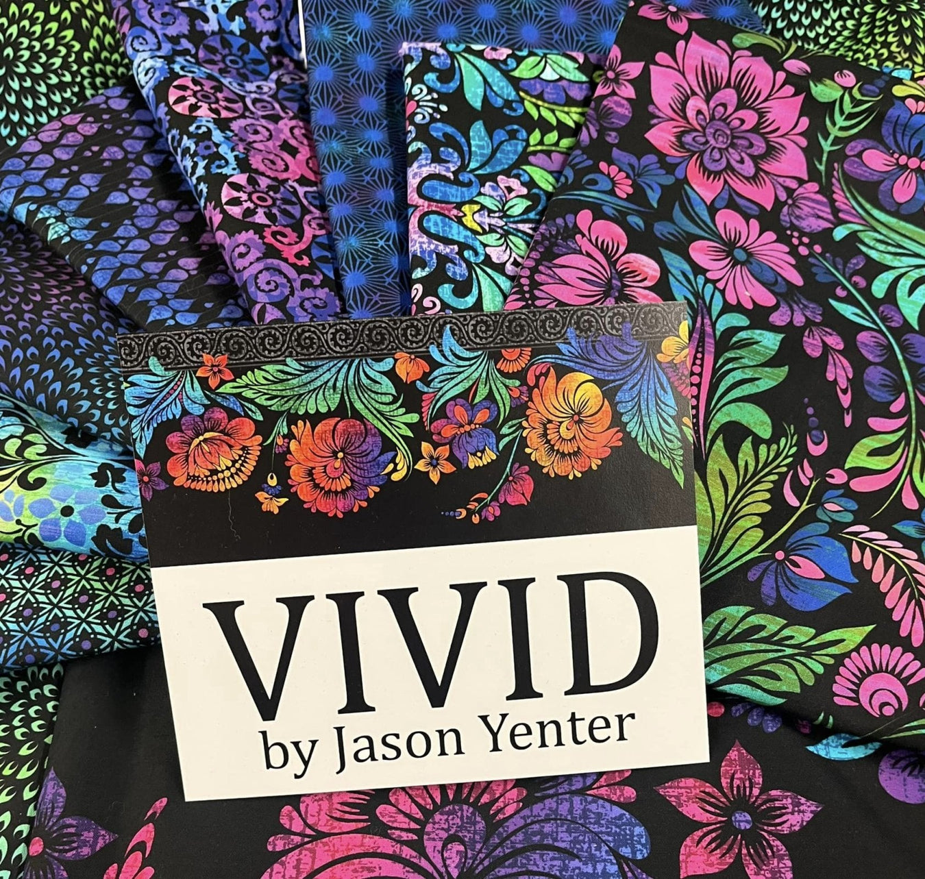 Vivid fabric collection by Jason Yenter showing all the fabrics laid out