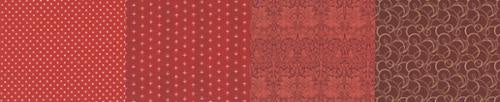 50 Years of Moda burgundy quilting fabric collection featuring rich red tones with dots, florals, and intricate patterns.