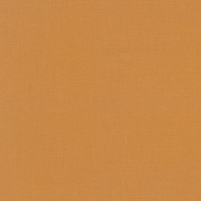 Caramel Kona Cotton solid fabric by Robert Kaufman. 100% cotton fabric in a warm caramel color.