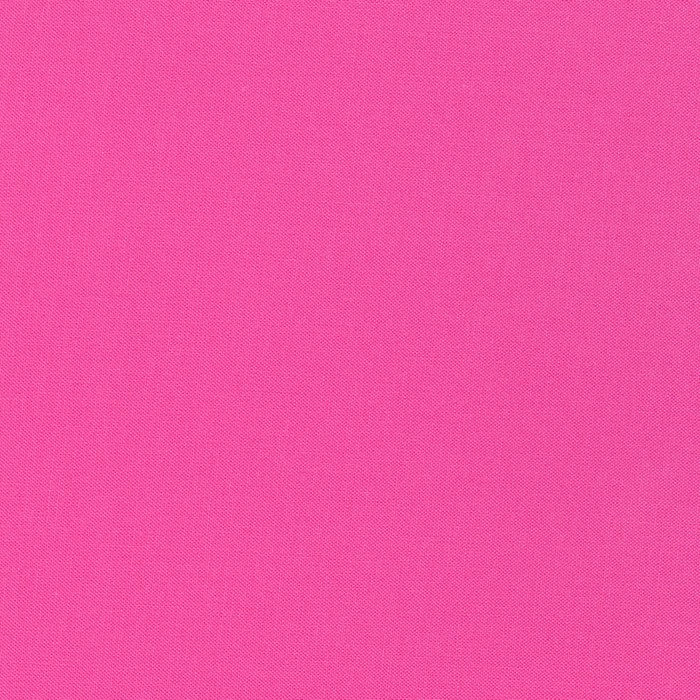 Dragon Fruit Kona Cotton solid fabric by Robert Kaufman. 100% cotton fabric in a vibrant fuchsia color.