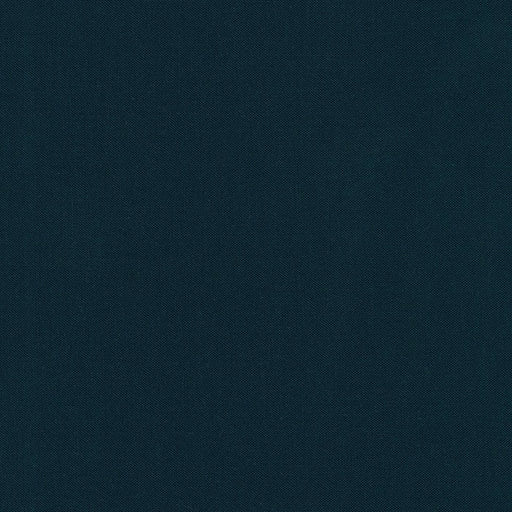 Indigo Kona Cotton solid fabric by Robert Kaufman. 100% cotton fabric in a deep blue color.