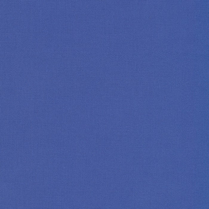 Lapis Kona Cotton solid fabric by Robert Kaufman. 100% cotton fabric in a deep blue color.