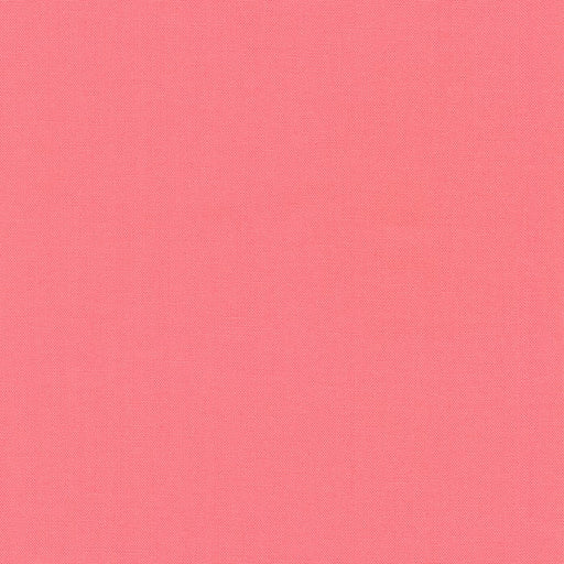 Melon Kona Cotton solid fabric by Robert Kaufman. 100% cotton fabric in a pink color.