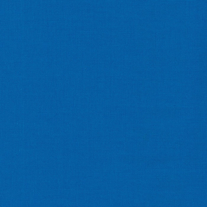 Pacific Kona Cotton solid quilting fabric by Robert Kaufman. 100% cotton fabric in a blue color.