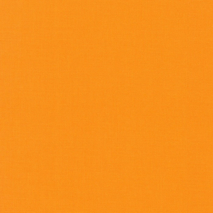 School Bus Kona Cotton solid quilting fabric by Robert Kaufman. 100% cotton fabric in an orange color.