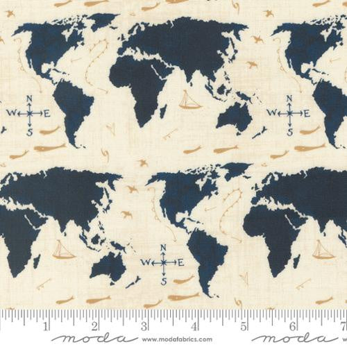 Longshore Seafarers Way Flag quilting fabric by Janet Clare. 100% cotton fabric with a repeating world map pattern featuring sailboats, airplanes, and compass roses in a natural color palette. Ideal for coastal-themed projects.