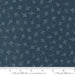 Longshore True North Night quilting fabric by Janet Clare. 100% cotton fabric with a star pattern on a dark blue background. Ideal for celestial-themed projects.